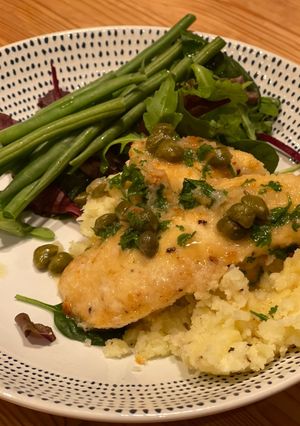 A picture of Chicken Breasts in a Lemon and Caper Sauce.