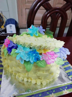 A picture of Eggless pineapple heart shape basket cake.