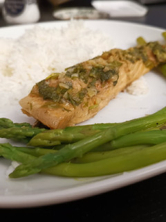 A picture of Steamed Salmon in sweet sauce.