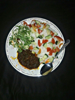 A picture of White rice & spinach stew.