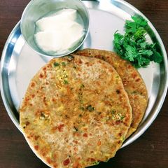 A picture of Paneer veggie stuffed paratha.