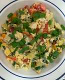 Huevos con calabacín, tomate cherry y espinaca