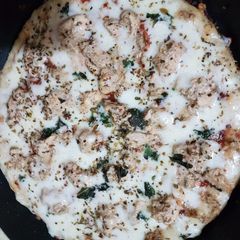 A picture of Malai Tikka pizza.