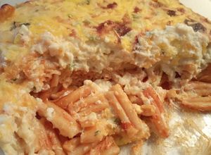 Una foto de Casarecce gratinados con tomate y bechamel