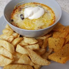 A picture of My Chilli Beef Topped with melted Cheese. 😘.