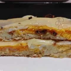 A picture of Egg In A Hole Sandwich.