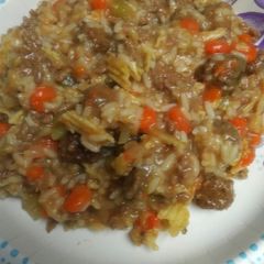 A picture of Creamy Boiled Beef with Tater Chips and Rice.