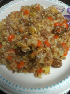 A picture of Creamy Boiled Beef with Tater Chips and Rice.