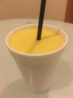 A picture of Mango Lassi (sweetened mango-yogurt drink).