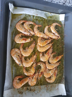Una foto de Langostinos al horno con vino