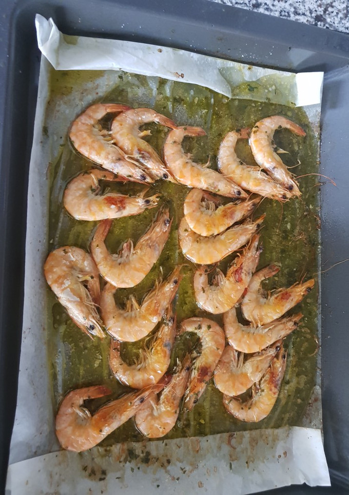 Una foto de Langostinos al horno con vino