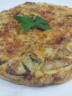 Una foto de Quiche sin masa, de puerros con champiñones