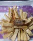 Peppered fried yam and fish