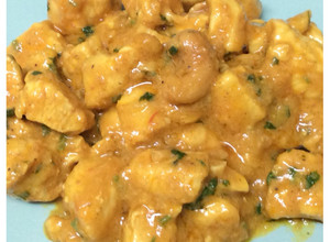 Foto principal de Pollo al curry con leche de coco y anacardos