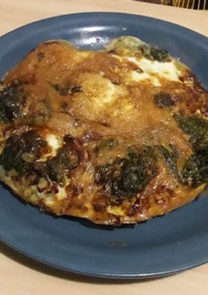 Una foto de Tortilla de cebolla y espinaca en la freidora de aire