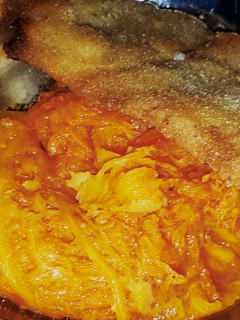 Una foto de Milanesa con Puré De Zapallo