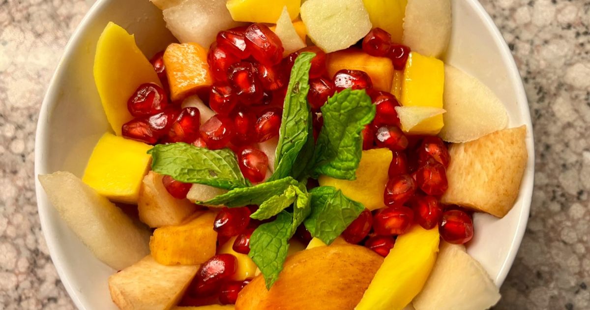 Fruit Salad With Quince, Mango, Persimmon, Pomegranate, Pear, Green ...
