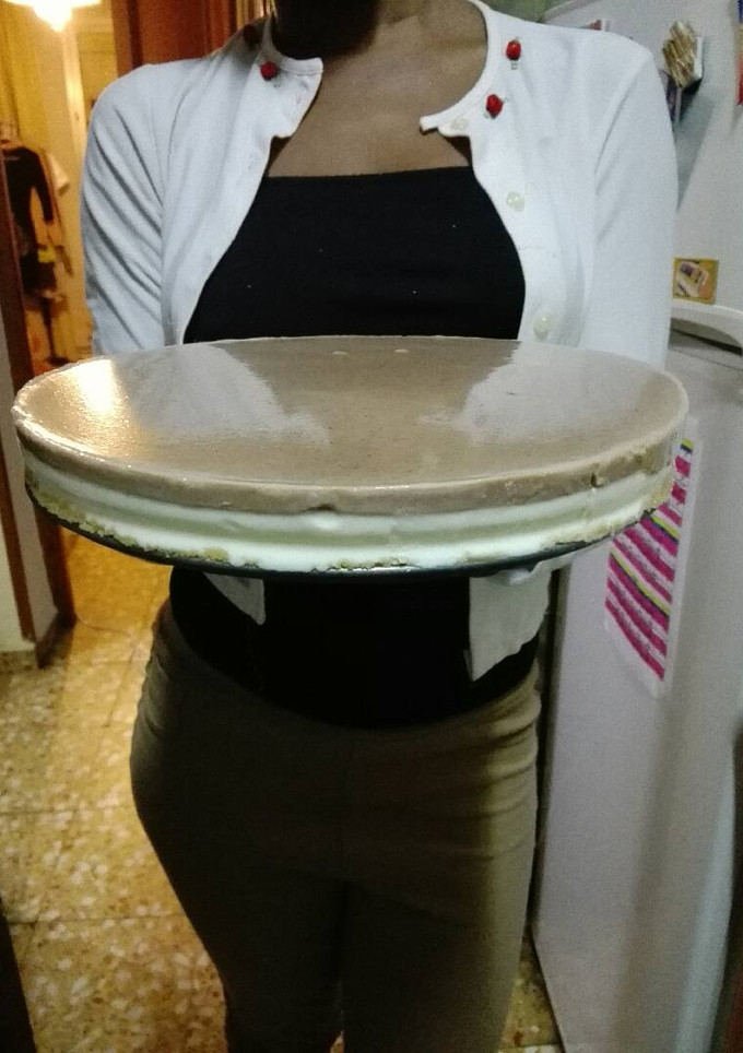 Una foto de Cheesecake con cobertura de chocolate