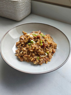 Una foto de Arroz meloso con longaniza y setas