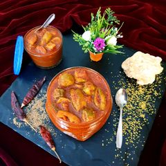 Sweet And Spicy Raw Mango Pickle A picture of Sweet And Spicy Raw Mango Pickle.