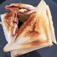 A picture of Brie, bacon and cranberry toasties.