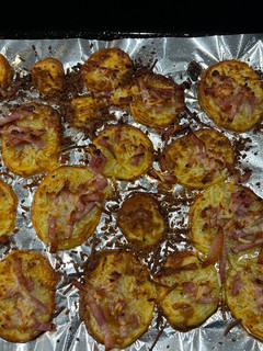 Una foto de Patatas al horno con bacon y queso