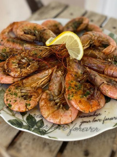Una foto de Gambas al ajillo 🦐 🧄