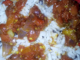 Rice and beans with peppered sauce