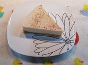 Una foto de tarta de quesitos y cuajada