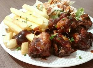 Una foto de Chupetas de pollo al horno en salsa Barbacue