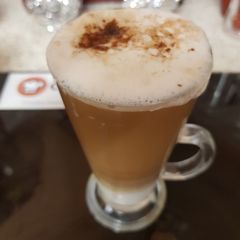 A picture of My Americano Frothy Coffee yummy with chocolate sprinkles 😋.
