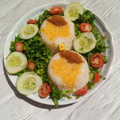A picture of Rice with palm oil.