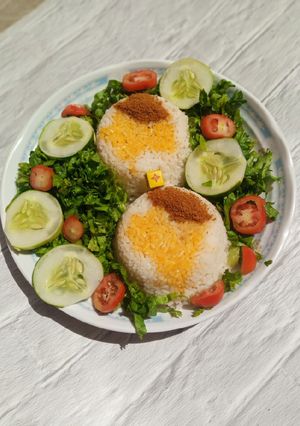 A picture of Rice with palm oil.