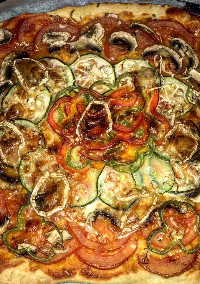 Una foto de Coca de verduras