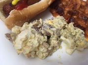A picture of potato salad with boiled eggs