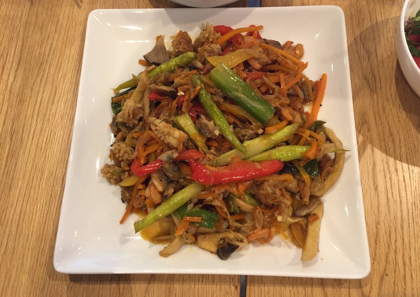 Seafood mix on fried veggies