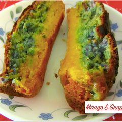 A picture of Mango and Black Grape Cake.