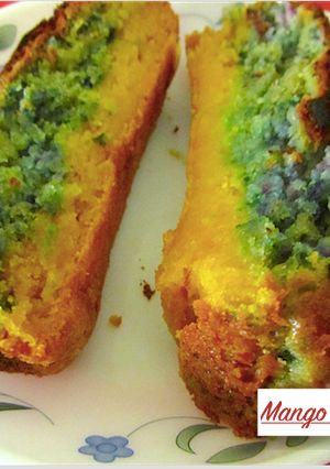 A picture of Mango and Black Grape Cake.