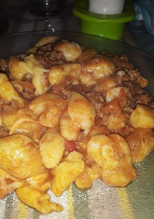 Una foto de Ñoquis con salsa boloñesa