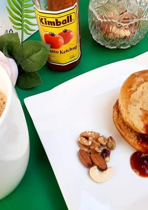 A picture of Anday Wala Burger With Tea 😋.
