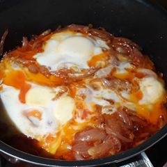 A picture of Egg and onion curry.