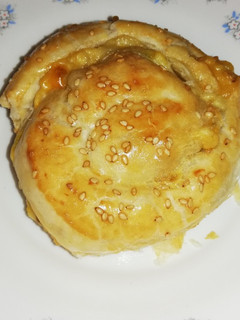 Una foto de Caracola de hojaldre rellena