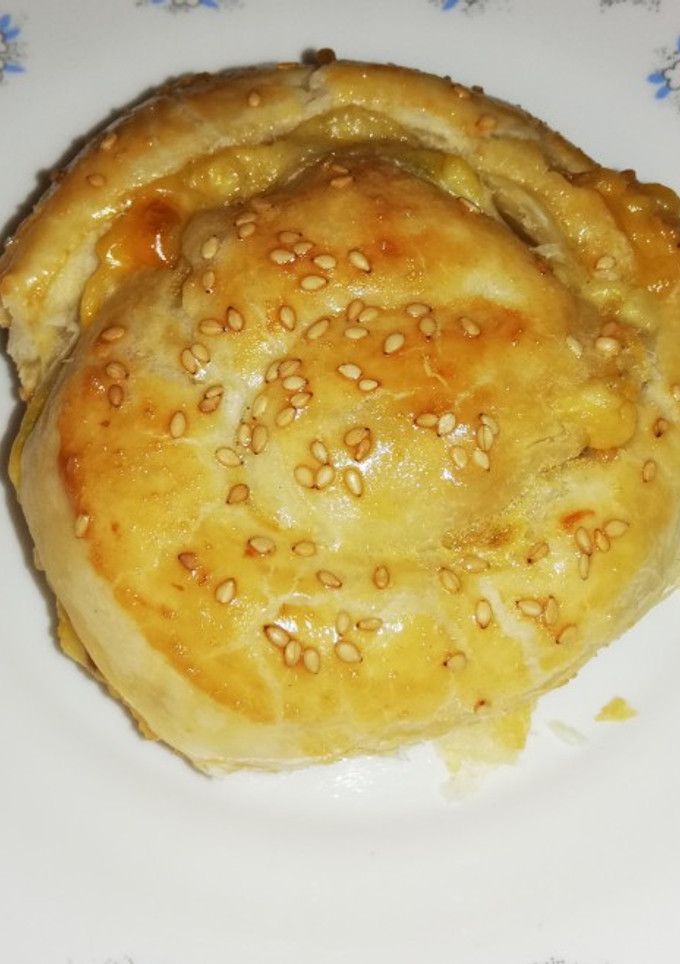 Una foto de Caracola de hojaldre rellena