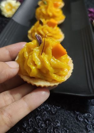 A picture of Cute Little "mango Sev Burfi short Bread Tart".
