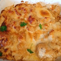 A picture of Cauliflower Cheese rolled in breadcrumbs.