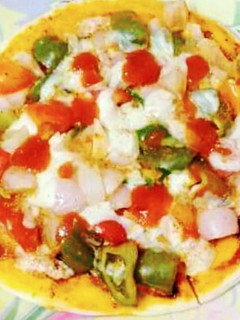 A picture of Healthy Oats and wheat flour pizza with cottage cheese.