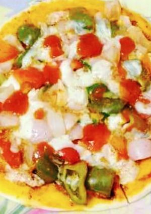 A picture of Healthy Oats and wheat flour pizza with cottage cheese.