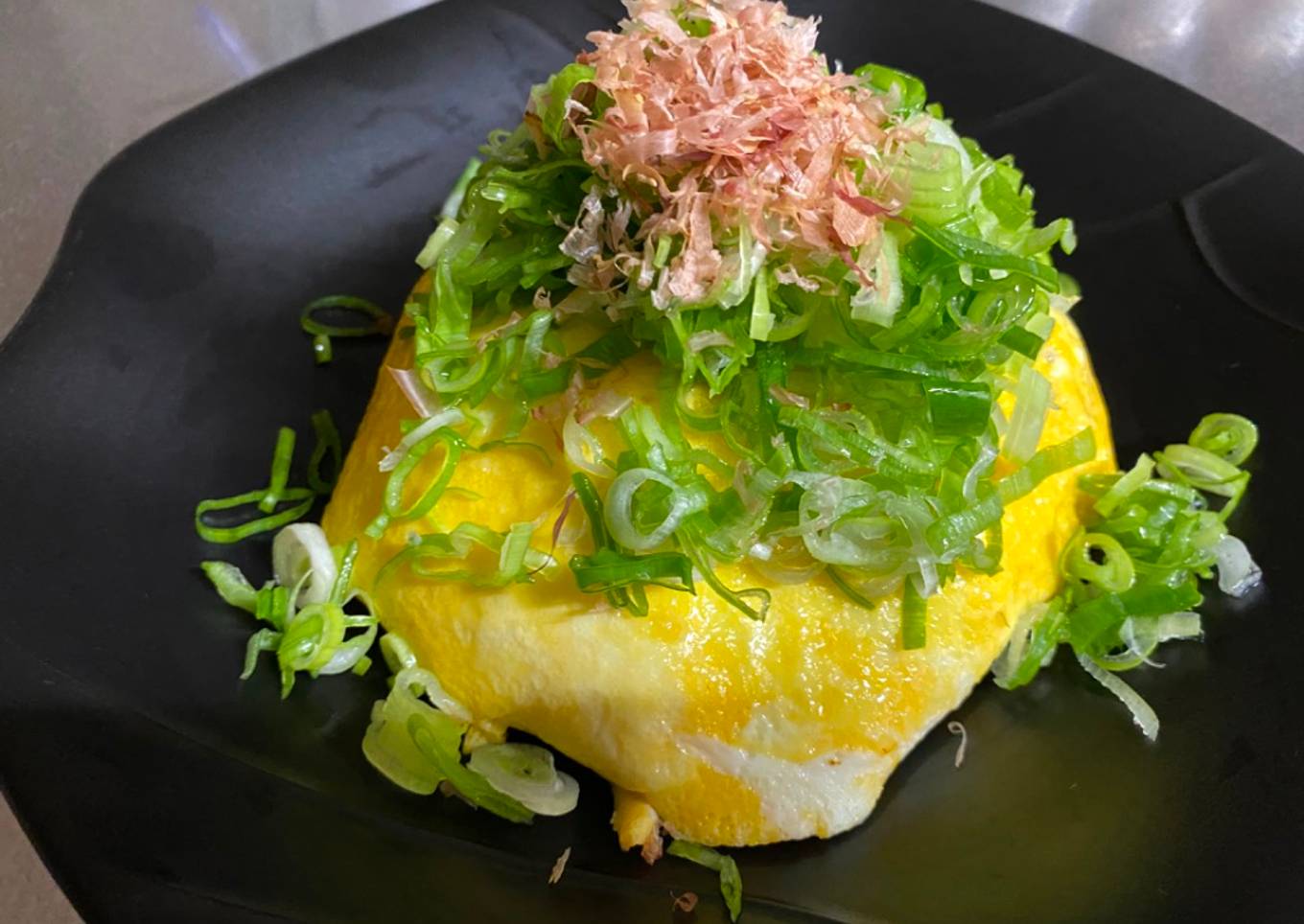 Step-by-Step Guide to Make Homemade Omu-Okonomiyaki (Japanese
as-you-like pancake wrapped with egg)