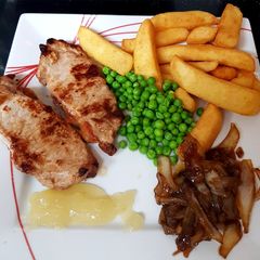 A picture of My pork loin chops with Carelamized onions & Apple sauce.😁.