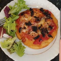 A picture of Potato pizzas with a little diffence.